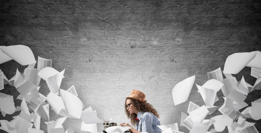 Young,And,Beautiful,Woman,Writer,In,Hat,And,Eyeglasses,Using